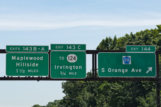 signs on the Garden State Parkway in New Jersey for Exit 143 B-A to Maplewood and Hillside, Exit 143 C to NJ-124 Irvington, and Exit 144 to CR-510 South Orange Ave