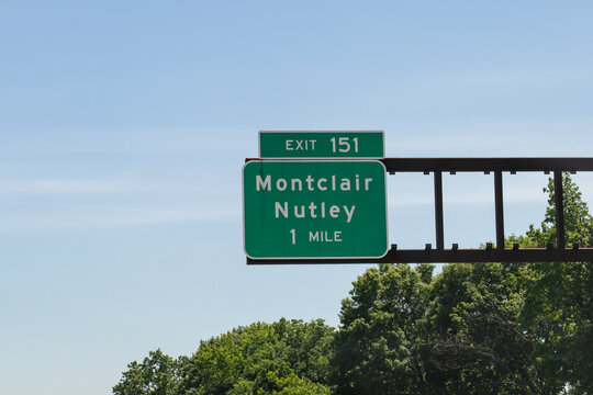 exit 151 sign for Montclair and Nutley on the Garden State Parkway in New Jersey