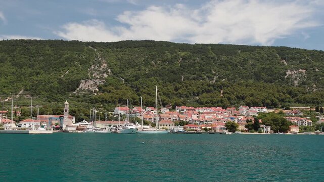 sea view panorama of Cres town, Croatia. Renaissance Arsan Palace in the historic center of Cres Island under a blue summer sky of Cres Island in Croatia