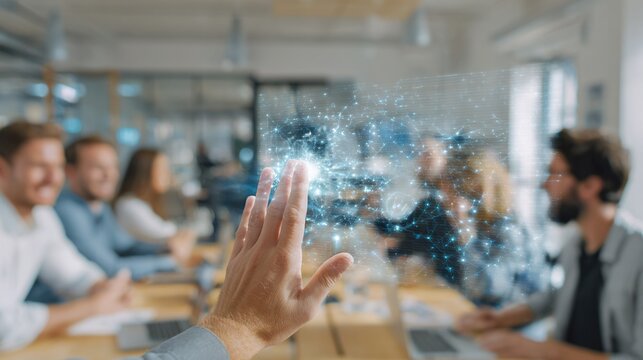 computer desktop projected on a wall in a meeting room, physical 3D cursor floating in air pointing at people