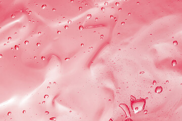 Obraz premium Pink transparent cosmetic product as background, closeup