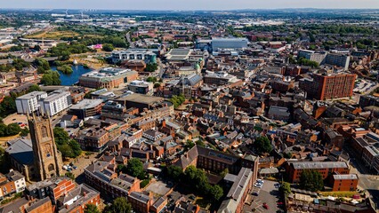 Fototapeta premium Aerial drone view of historic Derby city center with cathedral tower