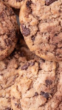 Closeup top view of chocolate chip cookies. Cookies backdrop