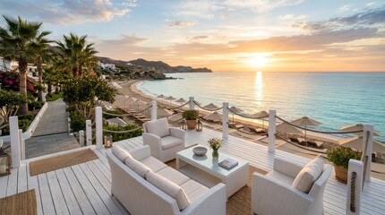 Fototapeta premium Luxury oceanfront house terrace overlooking a beautiful sunset at a tropical beach resort