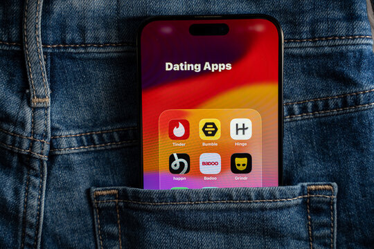 Dating app icons displayed on smartphone screen. Toronto, Canada - July 24, 2026.
