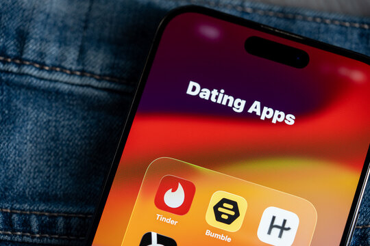 Dating app icons displayed on smartphone screen. Toronto, Canada - July 24, 2026.