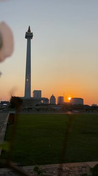 Jakarta, Indonesia &ndash; July 15, 2026: Sunset at the National Monument (Monas) area in Central Jakarta. The city of Jakarta.