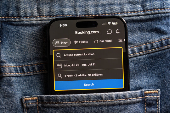 Close up of Booking.com travel app on smartphone screen. Toronto, Canada - July 24, 2026.