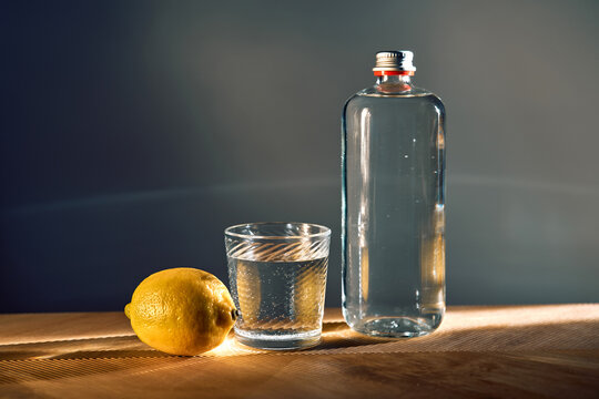 Drinking refreshing water with lemon for daily hydration