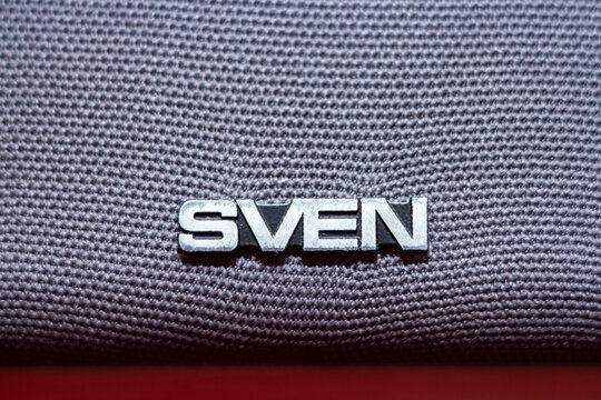Sven brand logo emblem on textured grey fabric background