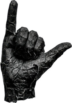 Textured black cracked leather hand giving rock gesture with rugged surface details industrial material detail grain isolated on transparent background