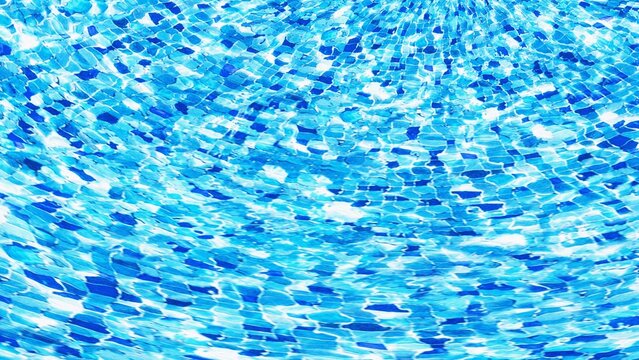 Blue mosaic tiles underwater rippled surface and light refraction