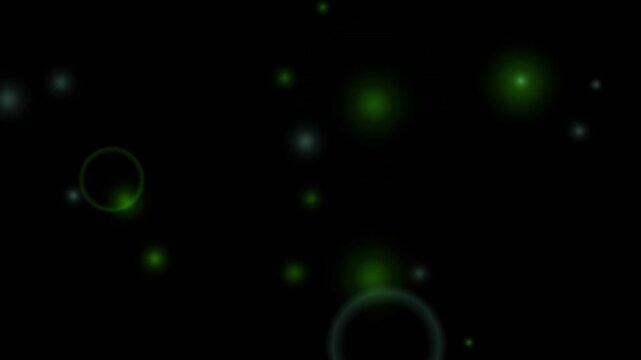 An abstract loop background featuring glowing green orbs and light circles floating against a black backdrop.