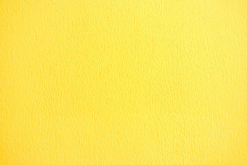 Naklejka premium Yellow stucco wall texture background with fine plaster surface