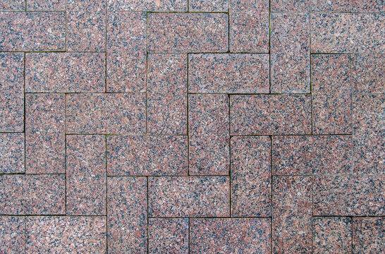 A top view of granite paving stone tiles surface texture