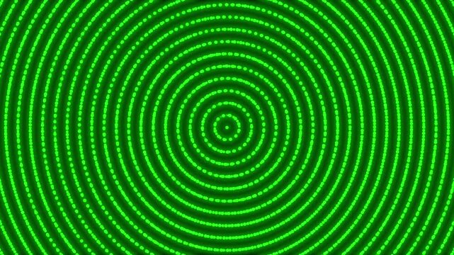 Green glowing dots and circle shapes spinning
