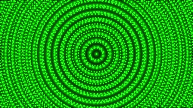 Green glowing dots and circle shapes spinning