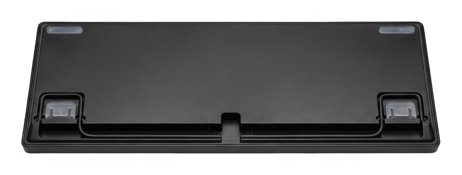 Bottom view of a black matte keyboard case with rubber feet and cable channel isolated transparent background image