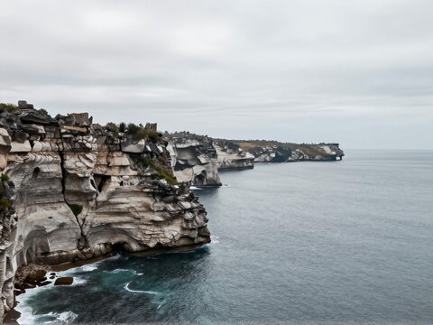 Kelingking Cliff Nusa Penida Under Overcast Moody Sky