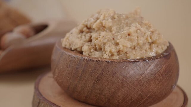 Hazelnut spread butter in a wooden bowl