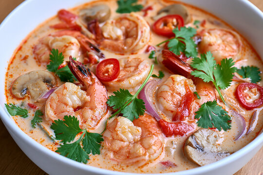 Creamy tom yum soup with shrimp mushrooms and chili
