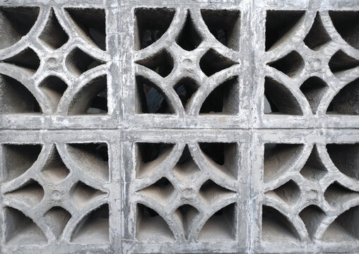 Decorative Concrete Breeze Block Wall with Geometric Pattern Texture Background