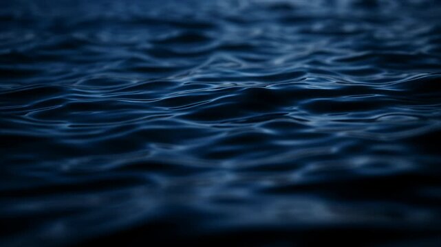 water waves closeup dark blue ocean at night