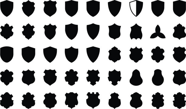 Collection of various black shield silhouettes and heraldic crest shapes for logo design and graphic projects