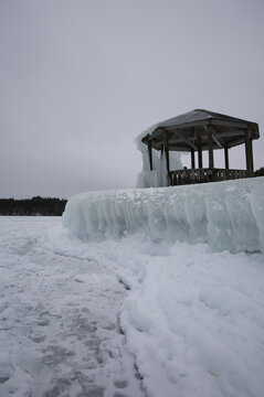 Impressive ice formations cover a wooden pavilion on the shore of Sweden&rsquo;s Lake V&auml;nern&mdash;created by freezing spray and waves during a fierce Scandinavian winter storm near &Aring;m&aring;l.