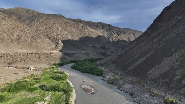 A picturesque landscape featuring the Chilik River in the mountains of the Almaty Region, southeastern Kazakhstan.	