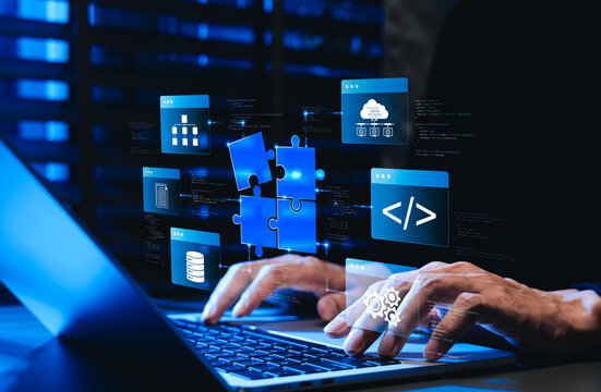 Low code no code development platform concept. Programmer using laptop, showing digital puzzle pieces connecting software modules, drag and drop app coding, application for rapid solution building