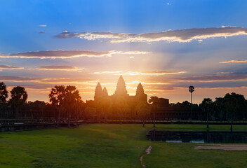 Fototapeta premium Sunrise view of popular tourist attraction ancient temple complex Angkor Wat - Siem Reap, Cambodia