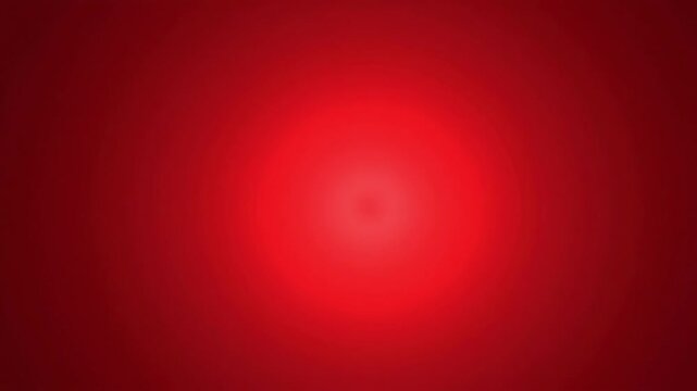 Abstract red background with a glowing central light spot