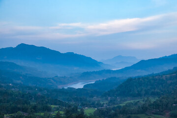 Fototapeta premium Mountain Range Landscape in Sri Lanka With Lush Forests and Morning Mist
