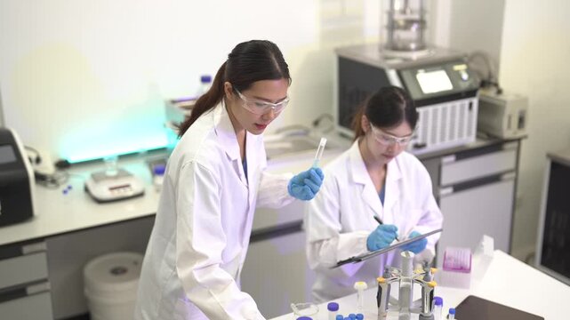 researcher holding petri dish with culture samples in a sterile clean room, biotechnology, microbiology, medical research, and laboratory innovation.