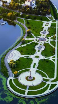 Vertical video. Yaroslavl, Russia. Strelka (Spit), Kotorosl flows into the Volga River. Sunset time. Drone footage. Rich colors