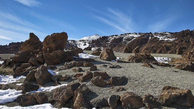 Snowy rocks in front of a mountain under clear sky, Teide, Parque Nacional del Teide, Teide National Park, volcano, volcanism, UNESCO World Heritage Site, Tenerife, Canary Islands, Spain