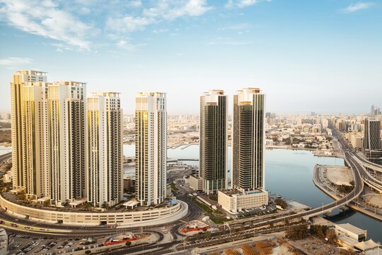 Abu Dhabi, UAE - 25th april, 2025: Aerial panorama luxury real estate property apartment buildings with cityscape view. Business hubs, real estate growth, futuristic urban development in Middle East