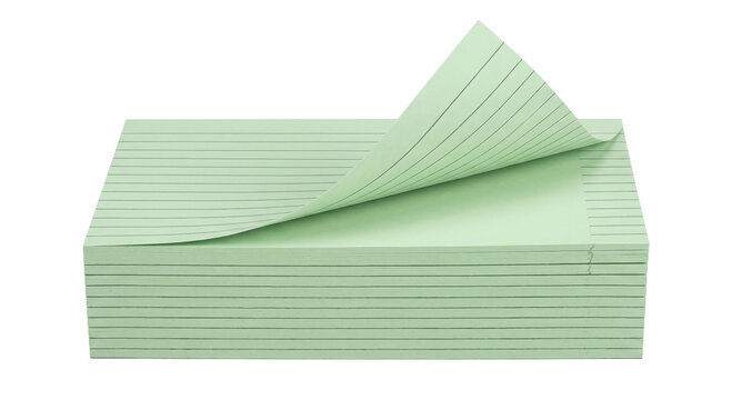 Stack of light green lined paper pads with one page peeling back