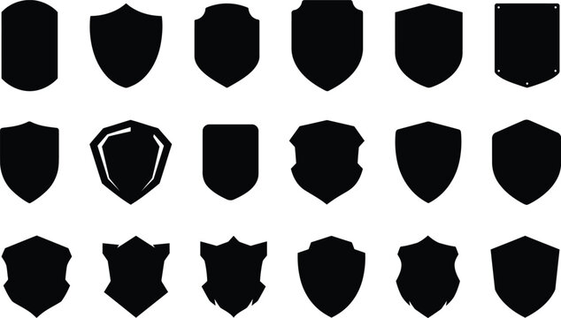 Set of various black shield shapes and heraldic crest silhouettes isolated on a white background