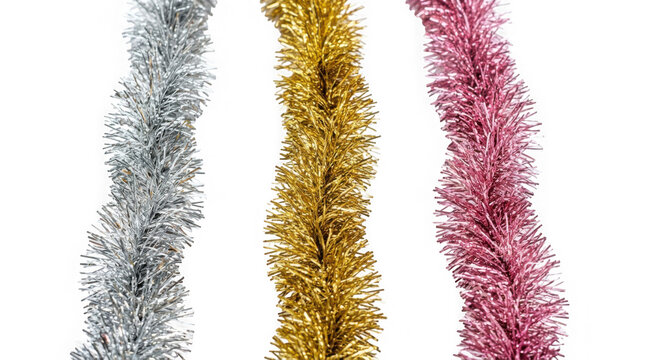 Three strands of shiny christmas tinsel in silver, gold, and pink isolated on transparent background