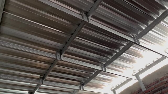 Interlocking light steel roof truss and ceiling grid framework construction