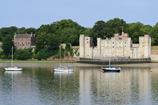 Looking across the River Medway early on a summer morning from St Mary's Island towards the village of Upnor. 