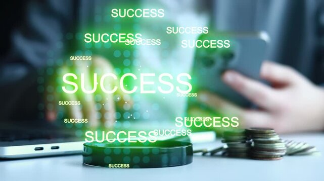 A person is at their desk looking at a phone. Green graphics of the word success surround them. Coins are stacked nearby, showing a focus on finances and achievement.