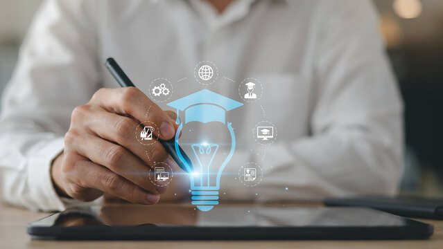 Educational digital learning concept with graduation cap and lightbulb icon on tablet education learning knowledge graduation technology academic university development training innovation