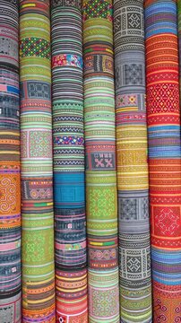 Closeup Sapa Fabric pattern stack  at Sapa Vietnam - Vietnam style Traditional Sculpture Cloth , Beautiful Background and abstract scene 