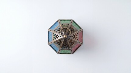 Fototapeta premium Handcrafted Ramadan lantern glowing with intricate patterns. Traditional festive Fanoos decoration for Islamic celebrations and home decor.