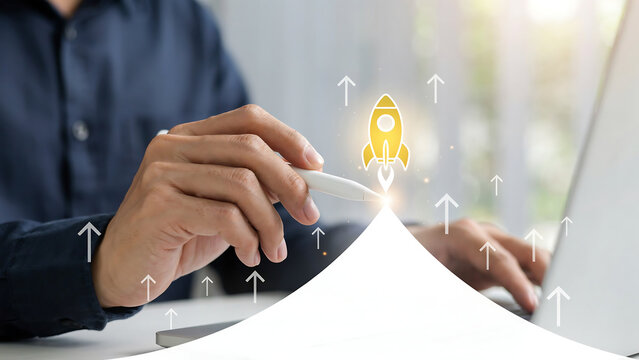 Entrepreneur launching startup project with digital rocket icon overlay on laptop business innovation technology strategy marketing entrepreneur development progress creative management