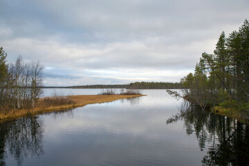 Obraz premium Calm autumnal landscape in Finland during autumn day.