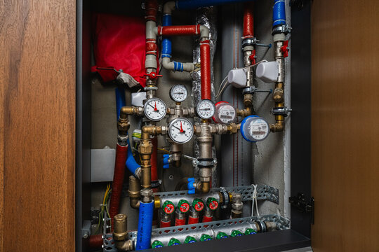 Water distribution manifold with pressure gauges and flow meters